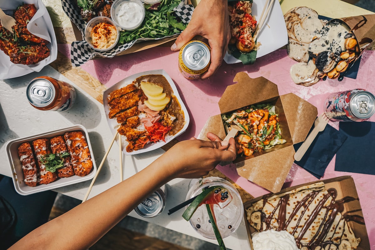 A table full of fresh takeout, ready for delivery